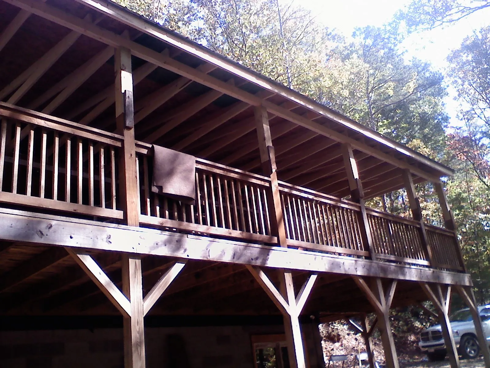 Timber framing under a new elevated porch and deck — Roof Leak Repair in Chapel Hill by Roofing Brothers